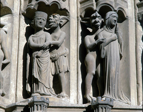 Chartres Cathedral South Porch central bay right archivolts demon and noblewoman demon and nun