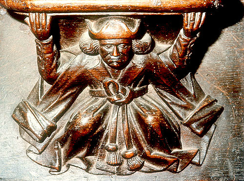 Misericord of front view of man supporting misericord, fifteenth century, Church of La Trinite, 15th century, Vendome, France