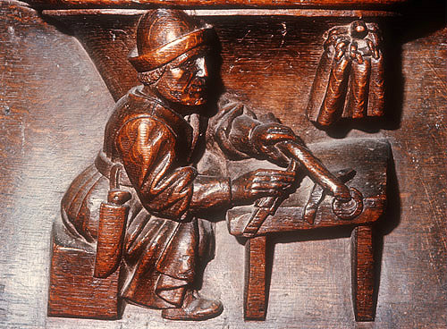 Misericord of candlemaker, fifteenth century, Church of La Trinite, Vendome, France