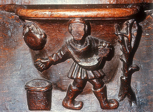 Misericord of  labour of month of March, sowing the seed, fifteenth century, Church of La Trinite, Vendome, France