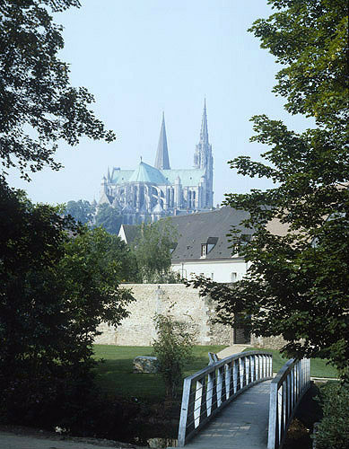 Chartres Cathedral, east north east view, footbridge in foreground, Chartres, France