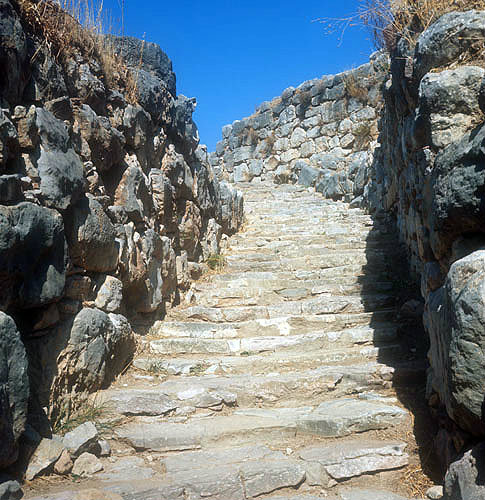 Stairway from postern gate, with cyclopean walls, Mycenaean fortress, Tiryns, Greece