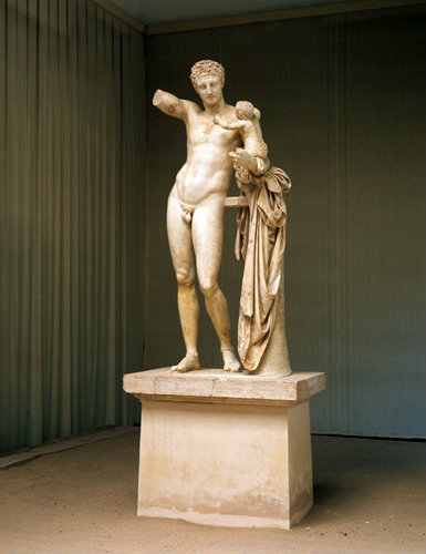 Hermes with the infant Dionysus a statue by Praxiteles now in the Museum at Olympia Greece