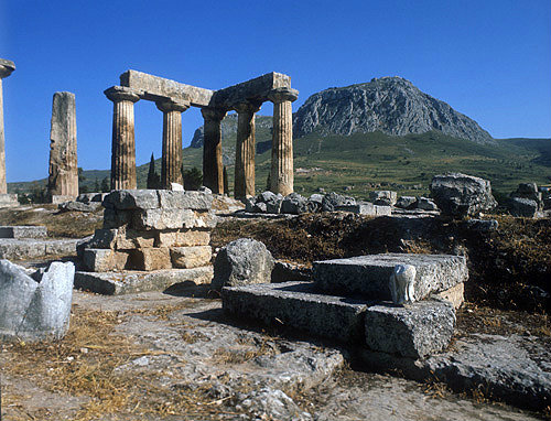 Temple of Apollo, sixth century BC, Acrocorinth in the background, Corinth, Greece