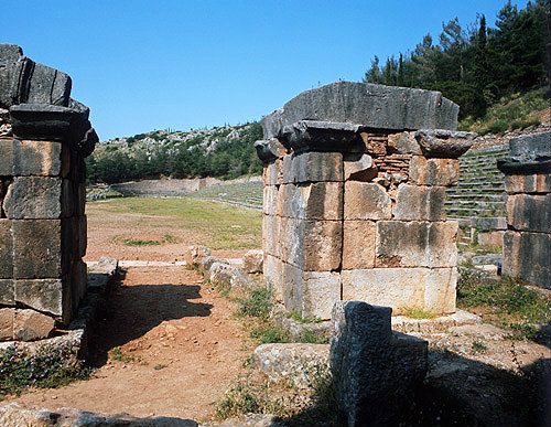 Stadium, fifth century, three of the four pillars to the entrance, Delphi, Greece