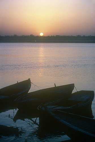 River Ganges at dawn, with fishing boats, India