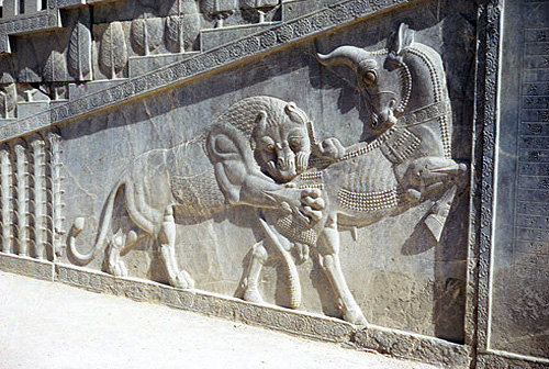 Iran, formerly Persia, Persepolis, capital of the Achaemenid Empire, bas-relief of lion attacking bull, audience hall (Apadana) of the palace of Darius I, begun 515 BC
