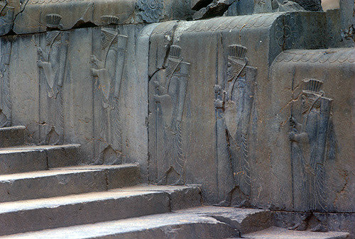 Sculpted frieze of figures mounting Apadana staircase, Persepolis, Iran