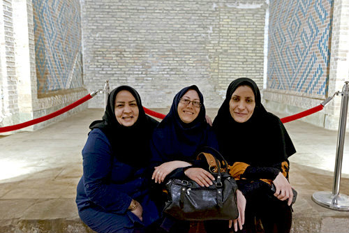 Three Iranian women at the Oljeitu Mausoleum, built 1302-12 by Mongol ruler Il-Khan Oljeitu, otherwise known as Muhammad  Khodabandeh, Soltaniyeh, Iran
