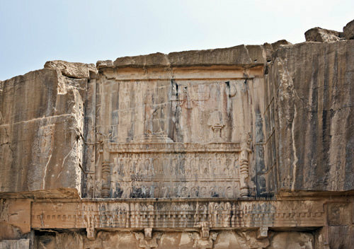 Upper part of presumed tomb of Artaxerxes III, with relief carvings cut into face of hill east of city, Persepolis, begun by Darius, capital of Achmaenid empire, Iran