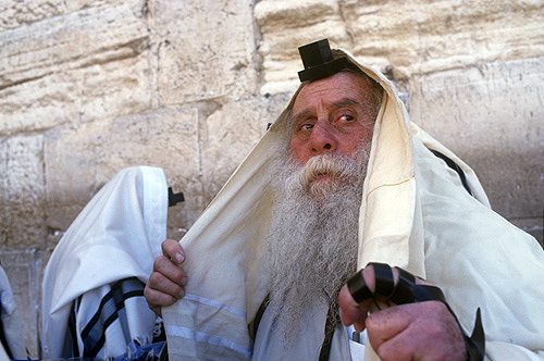 Israel, Jerusalem, an Ultra-Orthodox Jew prays with Tefillin (phylacteries) at the Western Wall