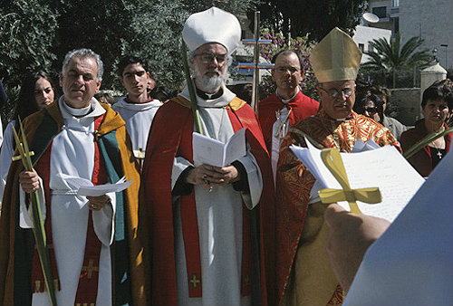 Israel, Jerusalem, Rowan Williams, the former Archbishop of Canterbury with the Clergy on Palm Sunday outside St George