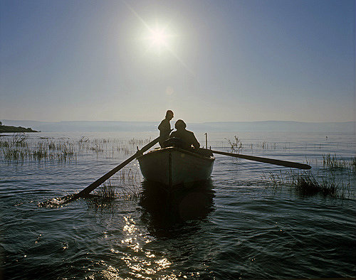 Fishermen on the Sea of Galilee at sunrise, Israel
