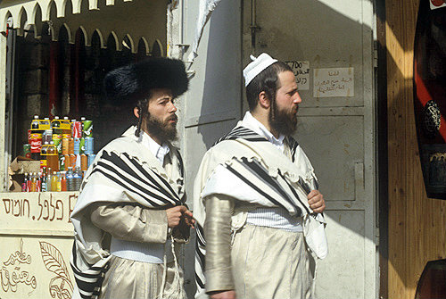 Israel, Jerusalem, two Ashkenazi Jews on Shabbat in the old city on their way to the Western Wall