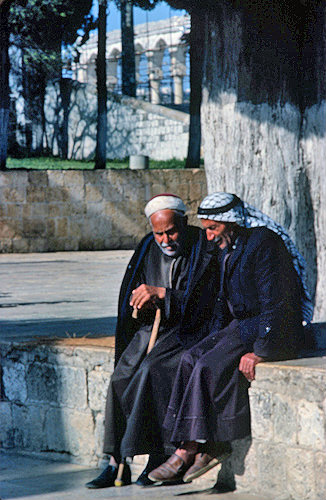 Israel, Jerusalem, two Arab men talking near the Dome of the Rock
