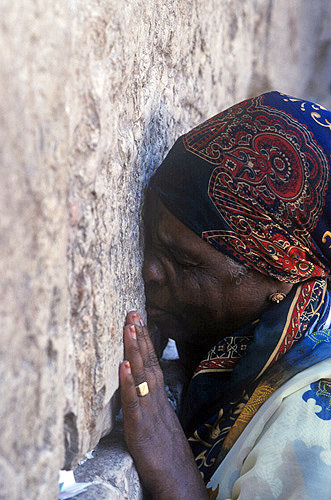 Israel, Jerusalem, the Western Wall a  woman praying