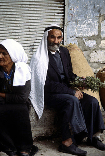 Israel, Jerusalem, old Arab sitting on the kerb