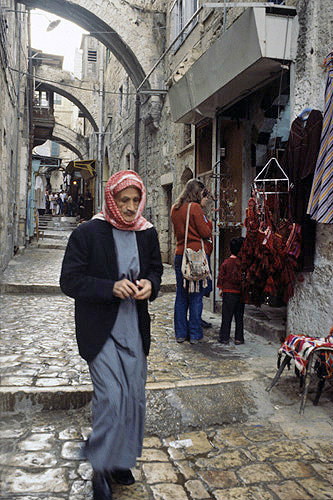 Israel, Jerusalem, Arab walking down the Via Dolorosa