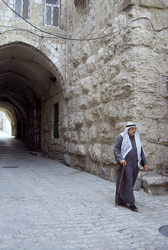 Israel, Jerusalem, Arab man walking in the old city