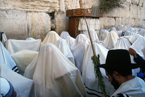 Israel Jerusalem Religious Jews from Cohenim perform the  priestly blessing at the Western Wall during the festival of Sukkot