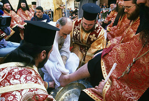 Israel, Jerusalem, Greek Orthodox priests, Maundy Thursday feet washing outside the Holy Sepulchre Church