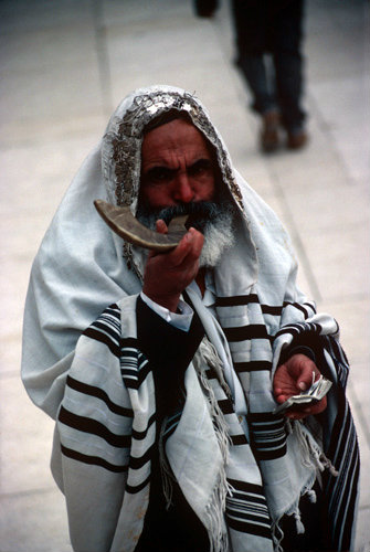 Israel Jerusalem Orthodox Jew blowing a Shofar at the Western Wall