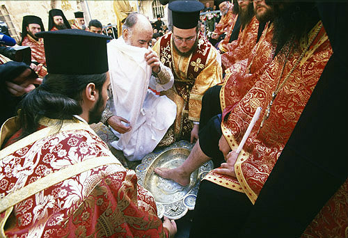 Israel, Jerusalem, Greek Orthodox priests, Maundy Thursday feet washing outside the Holy Sepulchre Church
