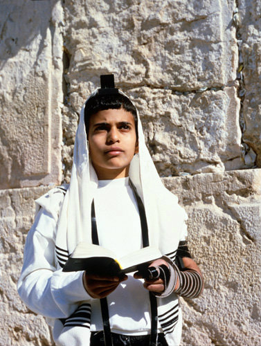 Israel Jerusalem Sephardic Jewish boy at his Bar mitzvah Ceremony at the Western Wall