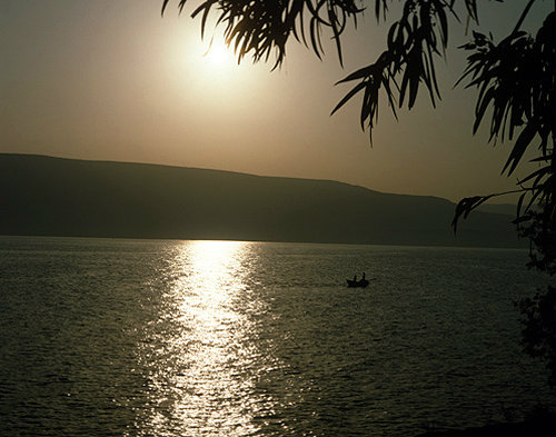 Israel, the Sea of Galilee, a boat at sunrise
