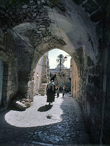 Israel, Jerusalem,  archway in old city, Dome of the Rock beyond