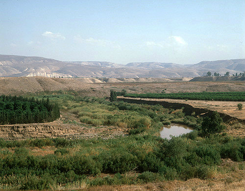 Israel, a loop of the River Jordan South of Galilee, Gilead Mountains in Jordan beyond, taken in 1984 before excessive extraction reduced its flow