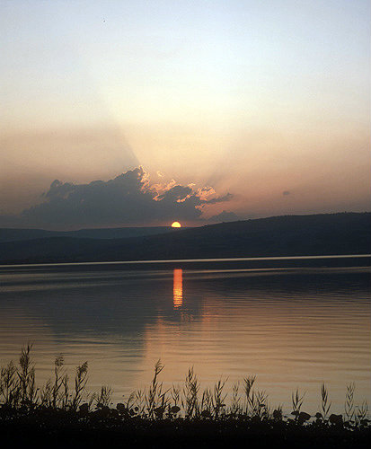 Israel, sun setting over the Sea of Galilee
