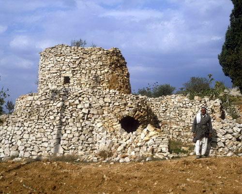 Israel, Samaria, arab outside his stone watchtower