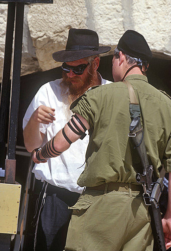 Israel, Jerusalem, soldier recieving Tefillin shel yad at Western Wall
