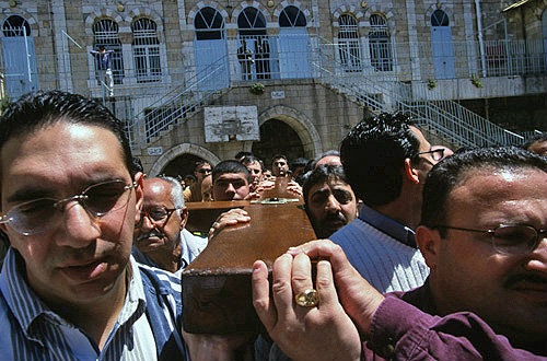 Israel, Jerusalem, Via Dolorosa, Good Friday Procession, Roman Catholic Arabs carrying the cross