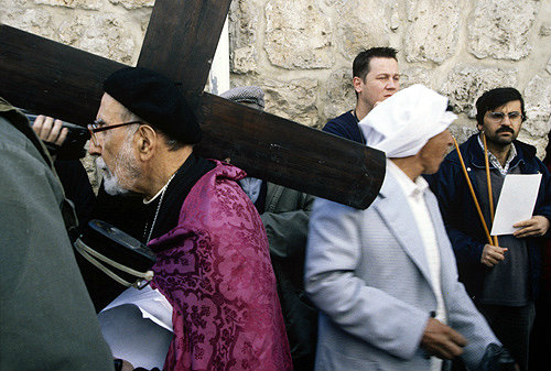 Israel, Jerusalem, Via Dolorosa, Good Friday Procession, Roman Catholic Cleric carrying the cross