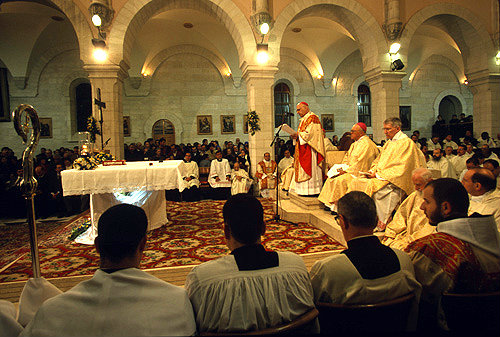 Israel, Bethlehem, the former Latin Patriarch of Jerusalem, Michel Sabbah, leads Midnight Mass