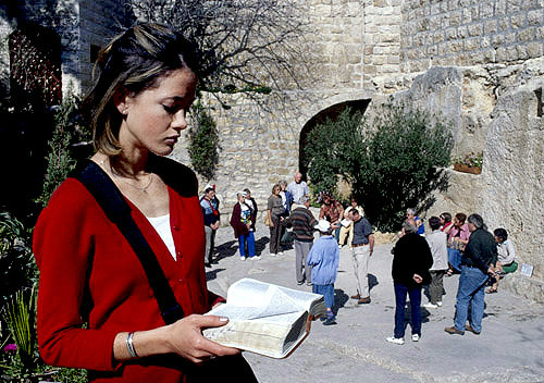 Christian girl at bible reading near Garden Tomb, Jerusalem, Israel