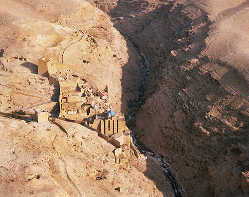 Mar Saba Greek Orthodox monastery, founded by Sabas in fifth century, and gorge on right, south east of Jerusalem, aerial view looking north, Israel