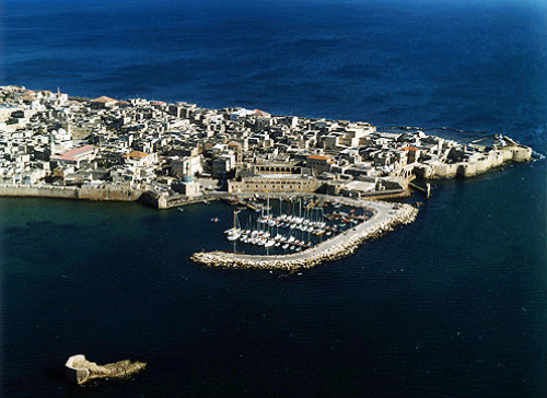 View of city, yacht marina and city walls, aerial, Acre, Israel