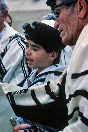 Israel Jerusalem Sephardic Jewish boy reading the Toray at his Bar Mitzvah ceremony