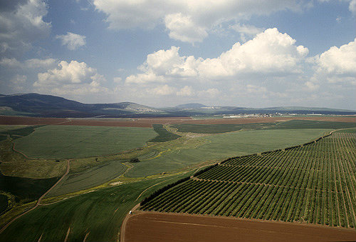 Israel, aerial view of cultivated fields in the Jezreel Valley looking east to Mount Tabor