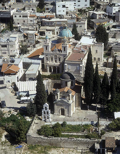 Greek Orthodox church with Catholic Franciscan Church (site of wedding at Cana) behind, Cana, Galilee, Israel