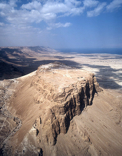 Israel, Masada, aerial view from the south of the ancient fortification on the eastern edge of the Judean desert, with the Dead Sea beyond