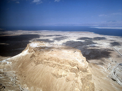 Israel, Masada, aerial view from the south west of the ancient fortification with the Dead Sea and Jordan beyond