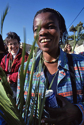 Israel, Jerusalem, an African pilgrim walking in the Palm Sunday procession