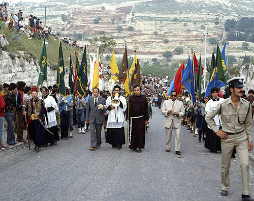 Israel, Jerusalem, Palm Sunday procession coming up towards the Lion Gate