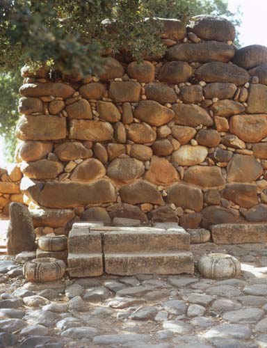 Podium next to iron age gateway built by Ahab, 9th century BC, Tel Dan, Israel