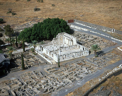 Synagogue, third or fourth century, and surrounding buildings from south east, aerial, Capernaum, Israel