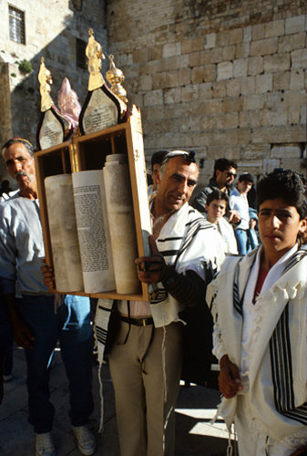 Israel Jerusalem Sephardic Jew raising the Torah at Barmitzvah ceremomy at the Western Wall